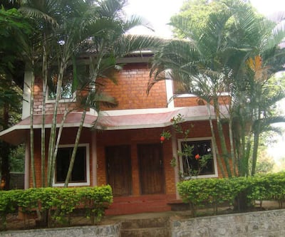 https://imgcld.yatra.com/ytimages/image/upload/t_hotel_yatra_city_desktop/v1435637071/Domestic Hotels/Hotels_Gudalur/Rock Gardens Holiday Resorts/Overview-_3.jpg